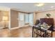 Inviting dining area featuring hardwood floors, a modern table setting, and natural light at 275 Pearl St # 11, Boulder, CO 80302
