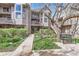 Charming exterior with lush landscaping and private balcony at 275 Pearl St # 11, Boulder, CO 80302