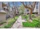 Well-maintained complex with mature trees and manicured landscaping at 275 Pearl St # 11, Boulder, CO 80302
