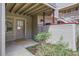 Inviting front porch with pleasant curb appeal and green shrubbery at 275 Pearl St # 11, Boulder, CO 80302