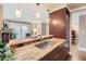 Open kitchen layout with granite counters, wood cabinets, and bar seating at 275 Pearl St # 11, Boulder, CO 80302
