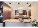 Stylish kitchen with designer cabinets, a breakfast bar, and modern lighting, perfect for entertaining and meal preparation at 275 Pearl St # 11, Boulder, CO 80302