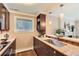Modern kitchen featuring granite countertops, custom cabinets, and stainless steel appliances at 275 Pearl St # 11, Boulder, CO 80302