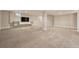 The finished basement offers plenty of room for entertaining, complete with modern lighting and built-ins at 4074 S Poplar Way, Denver, CO 80237