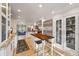 Bright, updated kitchen with stainless steel appliances and a spacious island with barstool seating at 4074 S Poplar Way, Denver, CO 80237