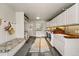 Well-organized mud room featuring ample storage, seating, and laundry facilities for convenience and functionality at 4074 S Poplar Way, Denver, CO 80237