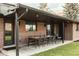 Outdoor patio with a dining area perfect for entertaining guests and enjoying outdoor meals at 2060 Kline St, Lakewood, CO 80215