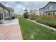 Well-maintained backyard featuring a lush lawn, garden beds, and a privacy fence at 12993 E 108Th Ave, Commerce City, CO 80022