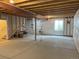 Unfinished basement providing a blank canvas for customization with exposed ceiling joists at 12993 E 108Th Ave, Commerce City, CO 80022