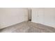 Bedroom with plush carpet, white trim, and closet at 12993 E 108Th Ave, Commerce City, CO 80022
