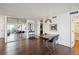 Dining area featuring hardwood floors, modern lighting, and storage at 1020 15Th St # 28G, Denver, CO 80202