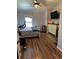 Comfortable bedroom featuring hardwood floors, closet storage, and a serene ambiance at 15507 E Louisiana Ave, Aurora, CO 80017