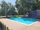 Community swimming pool surrounded by greenery and offering a peaceful setting at 15507 E Louisiana Ave, Aurora, CO 80017