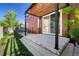 Inviting outdoor space with patio and landscaping, perfect for enjoying the outdoors at 1691 W 66Th Ave, Denver, CO 80221