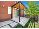 Backyard patio with pergola over the concrete area, perfect for outdoor relaxing at 1691 W 66Th Ave, Denver, CO 80221