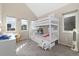 Cozy bedroom featuring a cute bunkbed with storage drawers underneath and bright, natural light at 1691 W 66Th Ave, Denver, CO 80221
