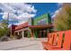 Stylish commercial building with colorful facade, outdoor seating, and inviting entrance at 1691 W 66Th Ave, Denver, CO 80221