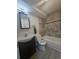 Bathroom featuring a dark vanity, modern tile, and combined shower and bathtub at 2767 W Iliff Ave # 1, Denver, CO 80219