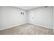 Carpeted bedroom with window and closet at 2767 W Iliff Ave # 1, Denver, CO 80219
