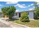 Charming single-story home with well-maintained landscaping and a welcoming entrance and driveway at 2767 W Iliff Ave # 1, Denver, CO 80219