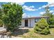 Charming home with neat landscaping, curb appeal, and inviting entrance at 2767 W Iliff Ave # 1, Denver, CO 80219