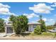 Inviting single-story home with manicured front yard and an attached garage perfect for new homeowners at 2767 W Iliff Ave # 1, Denver, CO 80219