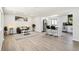 Open-concept living area with seamless transition to the kitchen for an amazing entertainment space at 2767 W Iliff Ave # 1, Denver, CO 80219