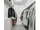 Walk-in closet with ample storage space, featuring clothing racks and shelving at 7318 S Xenia Cir # B, Centennial, CO 80112