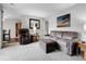 Spacious living room with comfortable seating and an open layout to the dining area at 7318 S Xenia Cir # B, Centennial, CO 80112