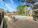 Inviting community pool with lounge chairs and well-maintained surrounding area at 7318 S Xenia Cir # B, Centennial, CO 80112