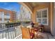 Cozy balcony with a table and chairs providing a relaxing urban retreat at 1100 Cherokee St # 304, Denver, CO 80204