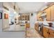 Open kitchen boasts stainless steel appliances, granite countertops, and tile flooring at 1100 Cherokee St # 304, Denver, CO 80204