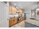 Well-lit kitchen boasts granite countertops, stainless steel appliances, and tile flooring at 1100 Cherokee St # 304, Denver, CO 80204