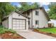 Charming two-story home with a two-car garage and well-maintained landscaping at 32 Powder Horn Pl, Longmont, CO 80504