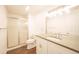 Bathroom with white vanity, tiled shower, and modern fixtures, providing a clean and functional space at 11606 Sagewood Ln, Parker, CO 80138