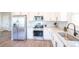 Modern kitchen with stainless steel appliances, sleek countertops, and ample cabinet space at 11606 Sagewood Ln, Parker, CO 80138