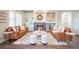 Elegant living room featuring a fireplace, a decorative mirror, and curated decor at 11606 Sagewood Ln, Parker, CO 80138