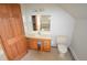 Well-lit bathroom featuring a modern vanity, toilet, and spacious layout at 74500 E 136Th Ave, Byers, CO 80103
