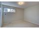 Simple bedroom features neutral carpet, one window and overhead lighting at 6272 S Garfield Dr, Centennial, CO 80121