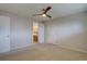 Well-lit bedroom with convenient access to a private bathroom, adding comfort and privacy at 6272 S Garfield Dr, Centennial, CO 80121