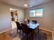 Dining area featuring wood floors, natural light, and space for intimate gatherings at 6272 S Garfield Dr, Centennial, CO 80121