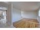A spacious living room featuring gleaming hardwood floors and a neutral color palette, perfect for versatile décor options at 6272 S Garfield Dr, Centennial, CO 80121