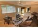 Inviting living room boasts natural light, a seamless flow to the kitchen, and comfortable seating arrangements at 6272 S Garfield Dr, Centennial, CO 80121