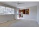 Inviting living room with a large window view into the kitchen, filling the space with light at 6272 S Garfield Dr, Centennial, CO 80121
