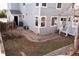 Backyard with a fenced yard, brick border and mature trees offer privacy and outdoor enjoyment at 18121 E Adriatic Pl, Aurora, CO 80013