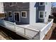 Backyard deck area, perfect for outdoor entertaining, with awning and privacy at 18121 E Adriatic Pl, Aurora, CO 80013