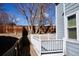 Backyard featuring a spacious deck, perfect for outdoor dining and relaxation, with privacy fence at 18121 E Adriatic Pl, Aurora, CO 80013