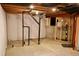 Exposed pipes and unfinished section of the basement, showing plumbing infrastructure and layout at 18121 E Adriatic Pl, Aurora, CO 80013
