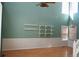 Bright living room featuring high ceilings, fresh paint and hardwood floors at 18121 E Adriatic Pl, Aurora, CO 80013