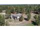 Desirable estate featuring a beautiful home, mature trees, and serene, sprawling landscape at 11790 Huckleberry Dr, Franktown, CO 80116